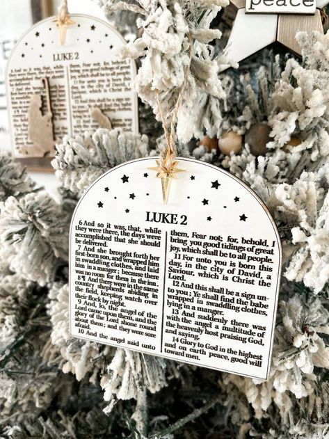 Decorate your home with Christian-themed Christmas trees featuring nativity scenes, scripture verses, and Jesus-inspired decor. Celebrate the true meaning of the season with these meaningful designs. Manger Christmas Ornament, Bible Verse Christmas Ornaments, Bible Ornaments Diy, Christmas Decor Christian, Nativity Themed Christmas Tree Ideas, Bible Verse Ornaments, Nativity Tree Christmas, Christmas Christian Decor, Diy Nativity Ornaments