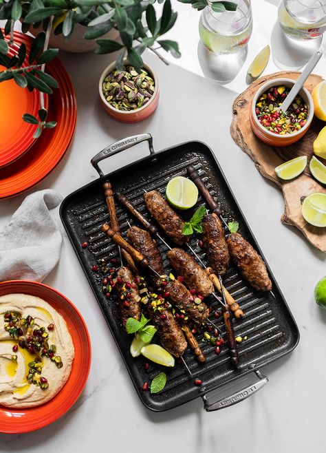 Dinner is served: Try these Greek Lamb Koftas with Pomegranate & Pistachio Salsa cooked with ease on our Toughened Non-Stick Grill. Pomegranate Pistachio, Lamb Koftas, Le Creuset Recipes, Greek Lamb, Searing Meat, Induction Oven, Ribs On Grill, Feel Good Food, Grilled Peaches