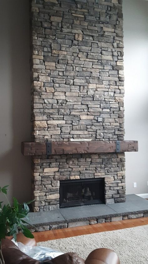 Stone fireplace remodel for an elegant look Stone Veneer Fireplace Farmhouse, Stone Fireplace High Ceiling, Dry Stacked Stone Fireplace, Slate Stone Fireplace, Diy Stone Veneer Fireplace, Stone Fireplace Surround Ideas, Versetta Stone Fireplace, Stone Fireplace And Tv, Stone Fireplace Ideas Living Rooms