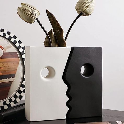 Elevate your home decor with the Ceramic Vase 🖤🤍 These abstract face-kissing vases bring a modern and artistic touch to any space. With their unique design, square shape, and monochromatic palette, they effortlessly blend into various interior styles. These vases can be used as flower vases or standalone decorative pieces. Arrange your favorite blooms or greenery in them to create stunning floral displays that become the center of attention. Simple Ceramics, Ceramics Decor, Black And White Vase, Living Room Tv Cabinet, Brown Vase, Face Vase, Cerámica Ideas, Abstract Art For Sale, Square Vase