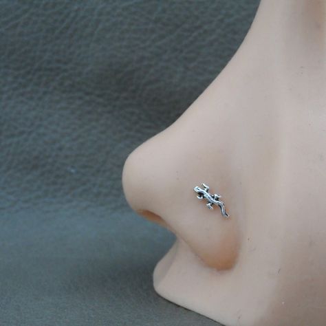 "A tiny Lizard Sterling Silver nose Stud. This nose stud is made of sterling silver so it is great for those with sensitive skin. The Lizard measures 7mm x 3mm The stud is made of 23g wire and has your choice of ball end or straight end. Ball End=6mm length Straight End= 9mm length. The straight end is bend to fit, it can be bent into an \"L\" shape. This listing is for one nose stud ( 1 piece)" Nose Piercing Cute Studs, Ladybug Nose Stud, Nose Piercing Stud Jewelry, Cute Nose Jewelry, Cute Nose Rings Studs, Nose Piercing Jewelry Studs, Aesthetic Nose Piercing Stud, Cute Piercings Nose, Cool Nose Piercings