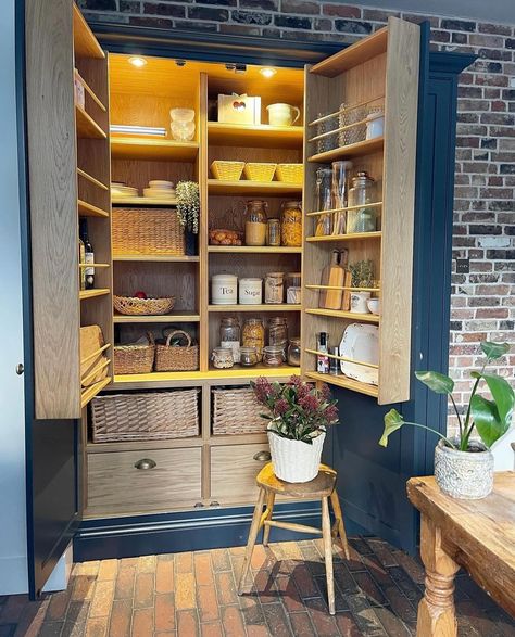 Larder Cupboards - A brilliant idea if there is no option for a pantry. Many kitchen companies supply these types of double door larder cupboards, off the shelf, but you could just as easily create something yourself, even an old wardrobe - converted, would do the job. Add shelves and sections for food, jars and other storage. We love the idea of painting the inside a different colour to the cabinate fronts, perhaps something bright or bold for a joyful burst of colour whenever you reach int... Old Wardrobe, Larder Cupboard, Food Jars, Kitchen Company, Double Door, Double Doors, Corner Bookcase, Pantry, Cupboard