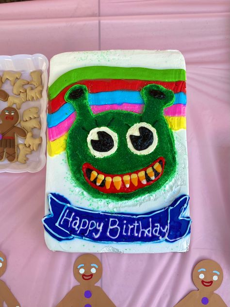 Shrek Happy Birthday smiley ogre cake Shrek First Birthday Boy, Shrek Birthday Party Cake, Shrek Theme Party Ideas, Shrek 3rd Birthday Party, Shrek Balloons, Shrek Birthday Party Decorations Diy, Shrek Decorations Party Ideas, Shrek Cake Ideas, Shrek Baby Shower Ideas