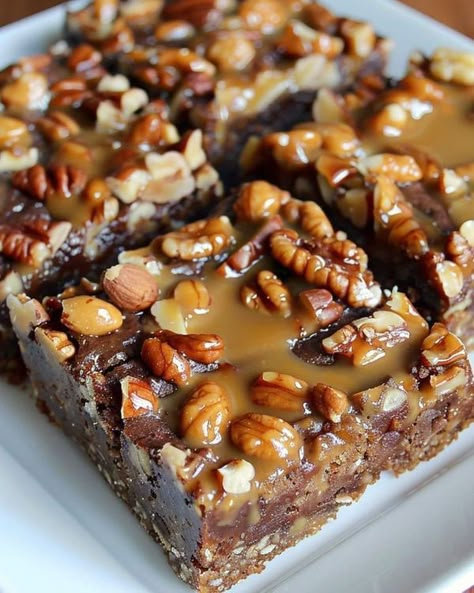 Martha Stewart Recipes | Chewy Nutty Squirrel Bars | Facebook Delicious Discoveries, Cheesecake Brownie Bars, Nutty Bars, Chewy Bars, Martha Stewart Recipes, Clean Eating Lunch And Dinner Recipes, Pecan Recipes, Delicious Cookie Recipes, Bar Cookies