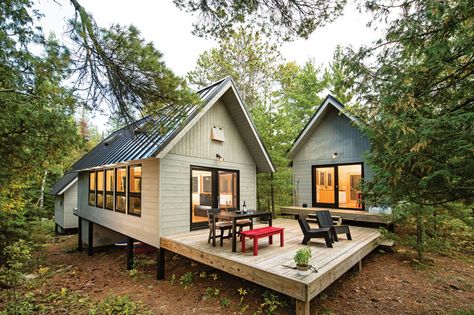 A family cabin on a Minnesota island is all about adventure. Small Modern Cabin, Black Barndominium, Shop Barndominium, Wooden Deck, Family Cabin, Cabin House Plans, Tiny Cabins, Barn Homes, Tiny House Cabin