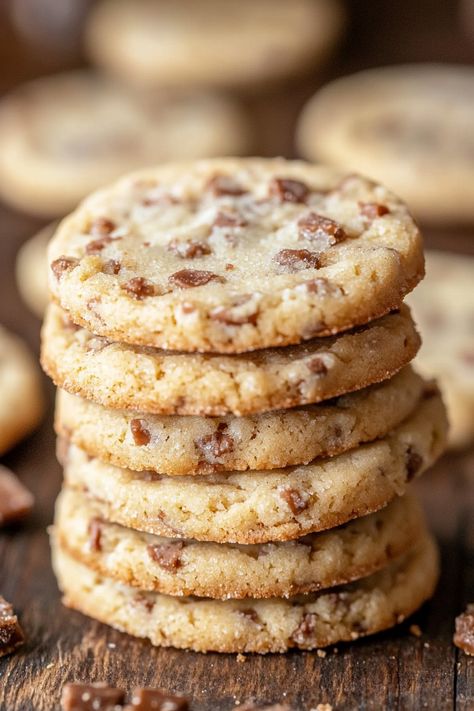 Searching for the ultimate make-ahead dessert? Try these Toffee Butter Icebox Cookies—soft, tender cookies filled with rich toffee bits in every bite. They're an effortless and quick dessert option that you can pop into the oven, filling your home with the aroma of fresh cookies just as your guests arrive. I'm completely taken with these Chocolate Caramel Pretzel Bark, Icebox Cookie Recipe, Fresh Cookies, Chocolate Caramel Pretzels, Icebox Cookies, Caramel Pretzels, Cookies Soft, Quick Dessert, Make Ahead Desserts