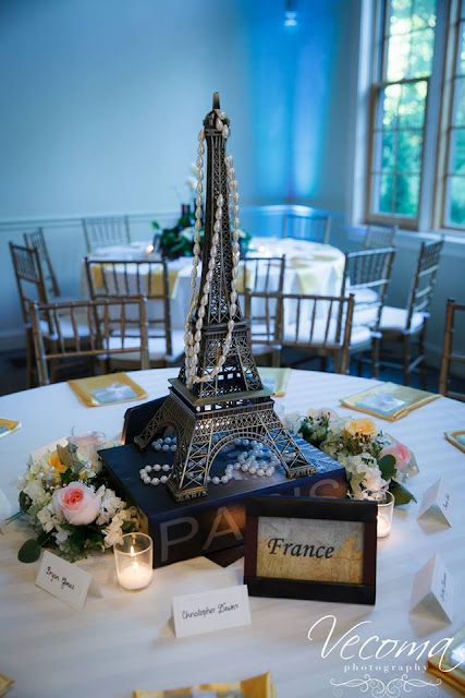 Midnight In Paris Theme, Paris Centerpiece Ideas, Paris Theme Wedding Reception, Eiffel Tower Vase Centerpieces, Paris Theme Flower Centerpieces, Effile Tower Vase Centerpieces, Eiffel Tower Centerpiece Paris Theme, Wedding Centerpieces Eiffel Tower Vases, Paris Theme Centerpieces