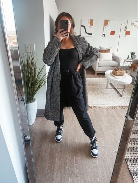 Jordan mids, black oversized joggers, black square neck bodysuit, oversized houndstooth coat. Sweats With Bodysuit Outfit, Sweats And Bodysuit Outfit, Bodysuit Sweatpants Outfit, Neutral Jordans, Bodysuit With Sweatpants Outfit, Comfy Black Outfits, Body Suit And Sweatpants Outfit, All Black Comfy Outfit, Joggers Outfit Fall