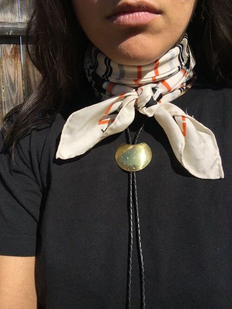 Turtleneck Dress Jewelry, Bolo Tie Women Outfit Summer, Bolo Tie Outfits For Women, Female Bolo Tie Outfit, Styling A Bolo Tie, Women’s Bolo Tie, Prada Bolo Tie Outfit, Bolo Tie Street Style, How To Style Bolo Tie