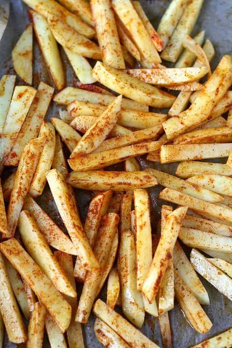 The BEST oven roasted french fries! These never last long, better make a double batch! #frenchfries #baked #roasted #potatoes #sidedish Homemade Fries In Oven, Oven Roasted Fries, Chicken And Fries, Halloween Meal, Burger Side Dishes, Oven Fries, Homemade Fries, Homemade French Fries, Best Oven