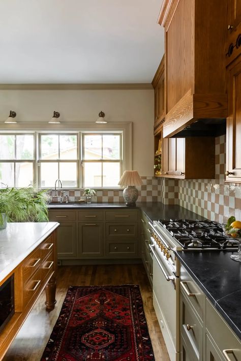 Two-tone green and wood cabinets paired with a checkerboard backsplash brought character back to the kitchen in this 1890 Queen-Anne style. Go inside the full home renovation. 2 Tone Kitchen, Craftsman Style Kitchen, Mudroom Makeover, Upper Kitchen Cabinets, Craftsman Kitchen, Kitchen Design Plans, Craftsman Bungalows, Green Kitchen, St Paul