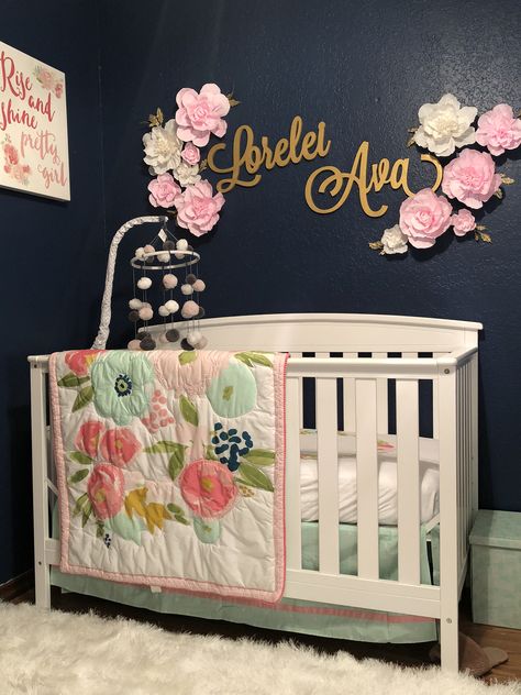 Baby girl room with navy blue walls Navy And Pink Nursery, Blue Nursery Girl, Ava Rae, Blue Girls Rooms, Monster Nursery, Blue Crib, Nursery Accent Wall, Purple Nursery