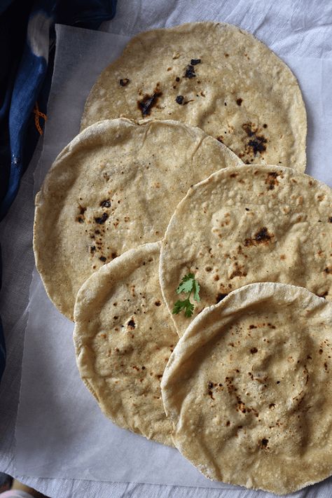 Jowar Bajra roti is one of the basic Indian flatbread recipe which is usually prepared along with different curries like besan pithla. Jowar atta is known as sorghum or new quinoa flour in english. Bajra atta is known as pearl millet flour in english. Jowar Bajra roti is quite popular in Gujarat as well in Maharashtra. I am basically from Gujarat and spent 8 years in Maharashtra so I got a chance to look closely to both the cultures. Continue reading Jowar Bajra Roti recipe at Curry Nation. Maharashtrian Recipes, Millet Flour, Sorghum Flour, Millet Recipes, Roti Recipe, How To Make Dough, Dal Recipe, Indian Bread, Flatbread Recipes