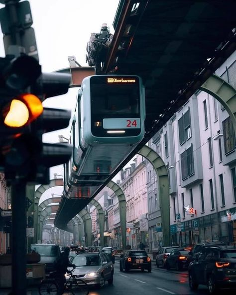 Amazing hanging train since 1901 Wuppertaler, Germany 🇩🇪 New York Architecture, Cyberpunk City, U Bahn, Aesthetic Japan, Futuristic City, Futuristic Cars, City Photography, Environment Concept Art, Retro Futurism