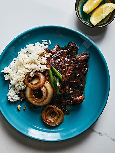 Quick Filipino-Style Rib-Eye Steaks (Bistek Tagalog) Recipe | Saveur Bistek Tagalog, Pork Ragu, Boneless Ribs, Steak And Onions, Water Spinach, Filipino Style, Cooking With Beer, Rib Eye, Interesting Recipes