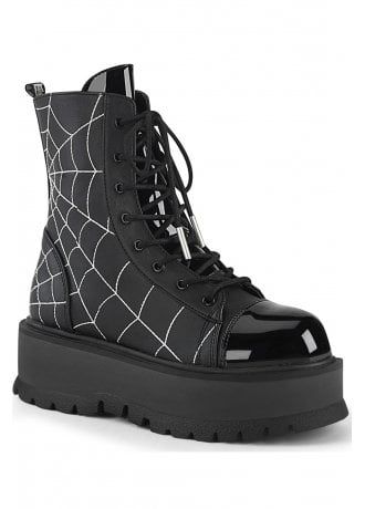 Demonia's Slacker 88 Spiderweb Boot is a vegan leather boot with patent accents. These awesome gothic platforms have a lace up front with inside zip and creepy embroidered spiderweb detail.  #Vegan #Gothic #boots #Shoes #Style #AltFashion Demonia Boots, Alternative Shoes, Demonia Shoes, Web Detail, Vegan Leather Boots, Punk Boots, Black Vegan, Platform Ankle Boots, Grunge Style