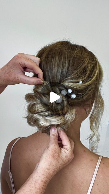 HANNAH TAYLOR on Instagram: "BRIDESMAID UPDO TUTORIAL ❤️ Using @cliphairlimited hair extensions just to add a little fullness to the bun, as you can see here I just took 1 row of extensions and folded it and attached to the ponytail, this will be really comfy and secure, and won’t affect anything when your pinning the hair in position. SAVE to go back to and please leave a comment if you’re feeling nice it’s always appreciated ❤️ . . . #updotutorial #lowupdo #hairtutorial #hairinspo #haireducation" Updo Bridesmaid Hair Ponytail, Soft Updo Hairstyles Tutorial, Wedding Hair Medium Length Tutorial, Long Hair Updo For Wedding Tutorial, Loose Bun Updo Tutorial, Twisted Low Bun Tutorial, Diy Bridesmaid Updo, Low Ponytail Wedding Hair Tutorial, Low Bun Updo Wedding Tutorial