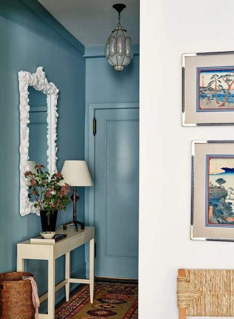 Small hallway ideas: How to make the most of tiny hallways | House & Garden Color Drench Small Hallway, Narrow Hallway Lighting Ideas, Colourful Hallway Ideas Entrance Halls, Narrow Hallway Coat Hooks, Bright Blue Hallway, Narrow Dark Hallway, Small Entryway Ideas Narrow Hallways, Tiny Hallway Ideas, Small Hallway Lighting