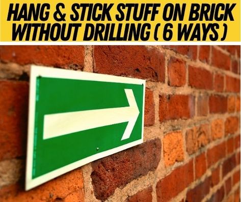 How To Hang & Stick Stuff on Brick Wall Without Drilling What Sticks To Brick Wall, Hanging Curtains On Brick Wall, Brick Hanger Hooks, How To Hang Shelves On Brick Wall, Drilling Into Brick, Photos On Brick Wall, Hang Things On Brick Walls, Hang Pictures On Brick Wall, Hanging Garland On Brick Wall