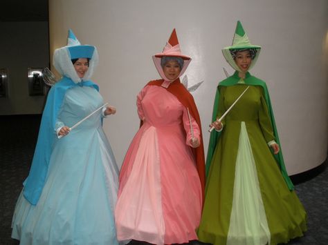 Sleeping Beauty Fairy Godmothers- Flora, Fauna & Merryweather Merryweather Costume, Sleeping Beauty Fairy Godmothers, Fairy Godmother Costume, Sister Costumes, Sleeping Beauty Fairies, Looney Tunes Bugs Bunny, Creative Costumes, Disney Cosplay, Disney Costumes