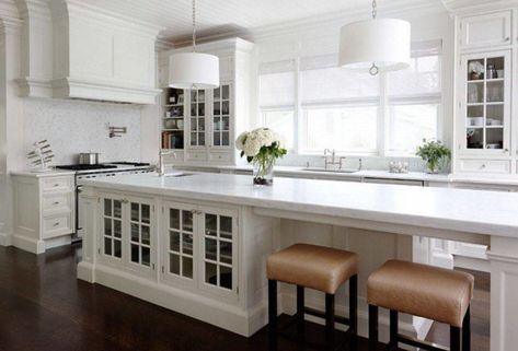 long white kitchen island with built in cabinets and low stools - Decoist Narrow Kitchen Island With Seating, Long Narrow Kitchen, Kitchen With Long Island, Narrow Kitchen Island, Kitchen Island Storage, Bench Seating Kitchen, Decoration Beton, Unique Kitchen Design, Long Kitchen