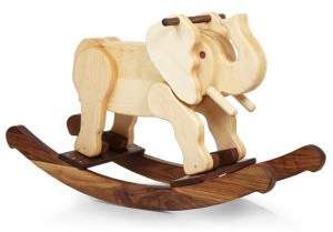 This elegant and playful elephant rocker is handcrafted in heirloom quality of maple and walnut, to become the centerpiece of decor in your child's nursery, and cherished for generations to come #rockinghorse #elephantdecor #nurserydecor #ad #nursery Elephant Rocker, Rocking Elephant, Woodworking Projects Gifts, Rustic Wood Projects, Dog Toy Box, Dog Table, Wood Toys Plans, Wooden Rocking Horse