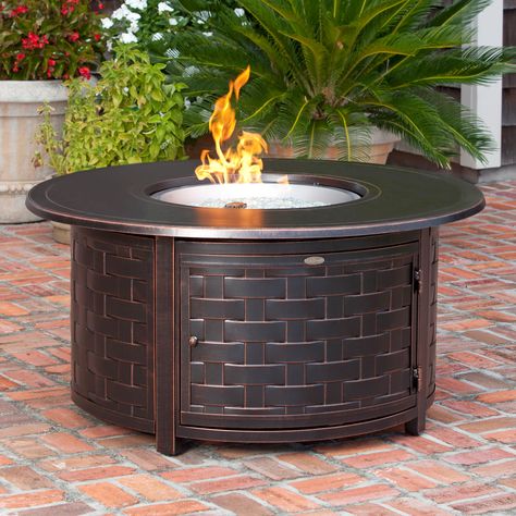 Fire Sense Perissa Woven Round Cast Aluminum Propane Gas Fire Pit | from hayneedle.com Round Propane Fire Pit, Linear Fireplaces, Hearth Rugs, Round Fire Pit Table, Chimney Caps, Fireplace Rugs, Gas Fire Pits, Fire Pit Ring, Fire Pit Furniture