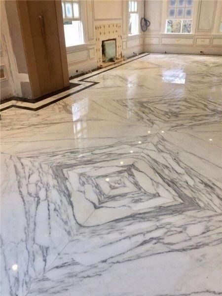 Private property. Calacatta Marble Bookmatch and Nero marquina #calacatta #calacattamarble #calacattacarrara #calacata #calacatamarble #calacattagold #carraramarmor #carraramarble #carraramarbledesign #interiorlovers #interiordesire #interior #interiors #tiles #marblework #marblebathroom #londonstone #londonmarble #marblecountertops #marbleitaly #italianmarble White Marble Floor Tiles, White Marble Tile Floor, Floor Pattern Design, Marble Floor Tiles, Flooring Bathroom, Marble Flooring Design, Statuario Marble, Floor Living, Floor Pattern