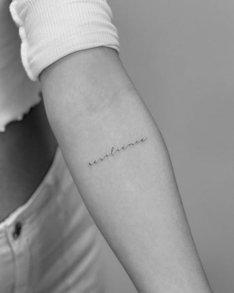 Tattoo of the word "resilience" located on the inner Inner Beauty Tattoo, Word Forearm Tattoos For Women, Resilancy Tattoo, Script Word Tattoo, Word Forearm Tattoo, Resilience Tattoos For Women, Small Script Tattoos For Women, Back Script Tattoo Women, Small Calligraphy Tattoo