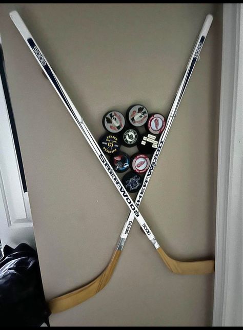 Hockey Stick Shelf, Hockey Themed Basement, Ice Hockey Bedroom, Hockey Jersey Display Ideas, Hockey Man Cave Ideas, Hockey Medal Display Ideas, Sporty Room Aesthetic, Hockey Bedroom For Boys, Hockey Room For Boys