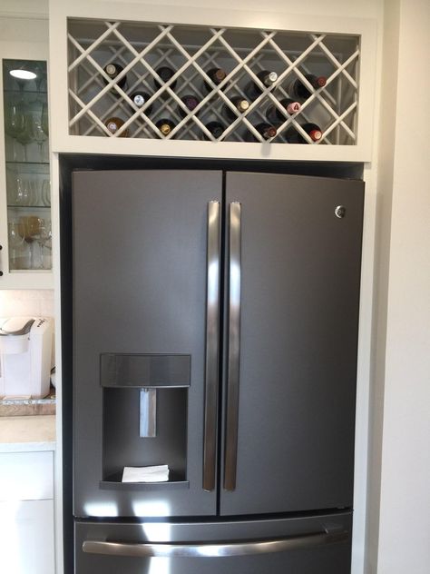 Cupboard Around Fridge, Frame Around Fridge, Around Fridge Cabinets, Fridge Surround Ideas, Over The Refrigerator Ideas, Fridge Surround Cabinet, Over Refrigerator Ideas, Wine Rack Over Refrigerator, Top Of Fridge Ideas