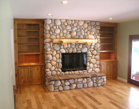 Working with the river rock... paint the built-in's grey? Love this with the book shelves!!! Riverstone Fireplace, River Rock Fireplace, Insulation Ideas, Stone Fireplace Decor, Morning Kitchen, Basement Insulation, Cozy Basement Ideas, River Rock Fireplaces, Rock Fireplace