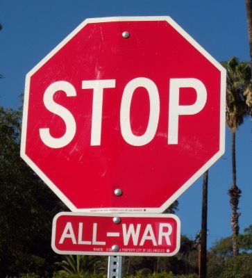 stop all war Critical Literacy, Silly Signs, Corny Pick Up Lines, Guerilla Art, Funny Street Signs, Culture Jamming, Skateboard Designs, Sign Language Interpreter, Protest Signs