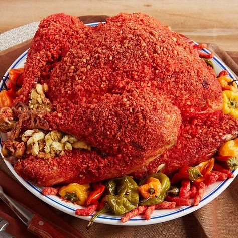 Cheetos® FLAMIN' HOT® Turkey Recipe | Reynolds Brands Cheetos Recipe, Moist Turkey, Deep Fried Turkey, Hot Cheese, Hot Cheetos, Spicy Cheese, Fried Turkey, Cheese Puffs, Turkey Recipes Thanksgiving