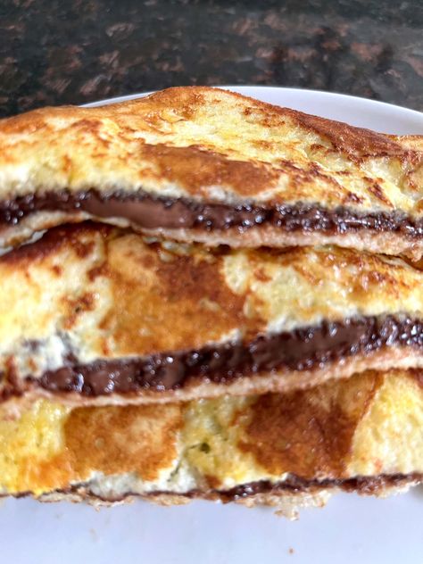 If you like Nutella, you will love this Nutella Stuffed French Toast. It's such a special breakfast that's really easy to make. Nutella French Toast Ingredients Nutella stuffed Nutella Stuffed French Toast, Candied Walnut Recipe, Best Easy Dessert, Breakfast Casserole French Toast, Nutella Sandwich, How To Make Nutella, Best Easy Dessert Recipes, Homemade French Toast, Simple Dessert Recipes