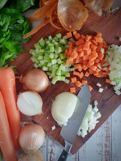 Carrots, onions and celery being prepared to make a mirepoix. Carrot And Celery Recipes, Onion Storage, Soup Starter, Celery Recipes, Welsh Recipes, Cooked Carrots, Red Sauce, Saute Onions, Homemade Soup