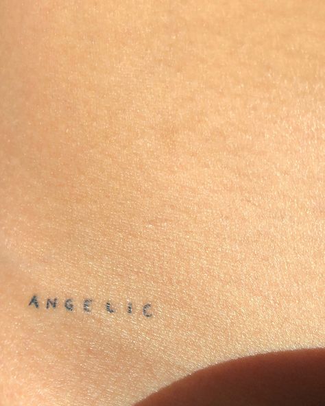 Dainty Words Tattoo, Angel Tattoo On Hip, Angel Hip Tattoo, 4 Letter Words Tattoo, Fine Line Tattoo Angel, Dainty Letter Tattoo, Angel Tattoo Word, Tiny Word Tattoos, Only Angel Tattoo