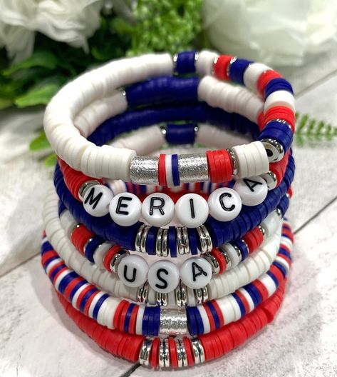 Popular Beaded Bracelets, Volleyball Clay Bead Bracelets, White And Blue Bracelet, Bead Bracelet Stack, Heishi Jewelry, Candy Bracelets, Heishi Bead Bracelet, Arm Candy Bracelets, Clay Bracelets