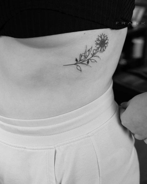 Sunflower tattooed under the breast. Below Breast Tattoo, Under Breast Tattoo Women, Sunflower Tattoo Ribs, Tattoos For Women Underboob, Sunflower Rib Tattoo, Underboob Flower Tattoo, Tattoo Inbetween Breast, Under Breast Tattoos For Women, Tattoo Ideas Underboob