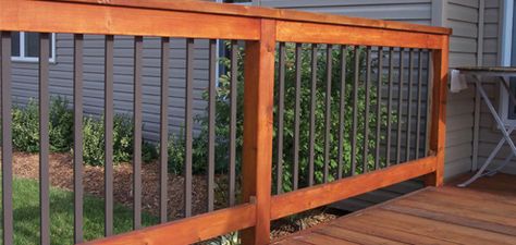 Face Mount "Iron" Balusters - nice upgrade for existing spindles. Wood Deck Railing, Porch Railing Designs, Deck Rails, Front Porch Railings, Deck Balusters, Deck Railing Ideas, Deck Remodel, Deck Railing Design, Patio Deck Designs