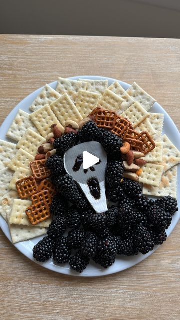 Bridget Lucille on Instagram: "Ghost Face Snack Board 🔪🧀

Recipe:
- Brie cheese
- blackberry jelly
- blackberries 
- crackers, nuts and pretzels 

Let me know if you make this! 

#halloweenpartyideas #halloweenparty #halloweensnacks #cheeseboard #halloweenfood #halloweenaesthetic #screammovie #halloweenvibes" Coffin Cheese Board, Ghost Face Charcuterie, Snack Board, Scream Movie, Charcuterie Recipes, Brie Cheese, Ghost Face, Halloween Snacks, Ghost Faces