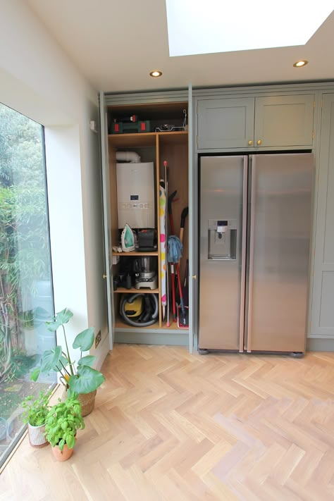 Ironing board and boiler cabinet Wanstead | London | Laura Gompertz Interiors Boiler Cabinet Ideas, Utility Cabinet Kitchen, Boiler Storage Ideas, Cover Up Boiler In Kitchen, Utility Corner Ideas, Boiler In Kitchen, Kitchen Boiler Disguise, Hidden Boiler Bathroom, Utility Cabinet