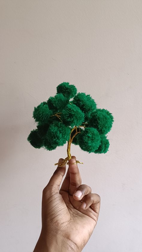 Made with gold wire and woolen Craft Tree, Woolen Craft, Pom Crafts, Tree Craft, Pom Pom Crafts, Wool Crafts, Tree Crafts, Gold Wire, Pom Pom