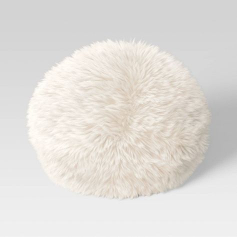 Spruce up the look of your seating or sleeping ensemble by adding a luxurious, glam flair with this Long Faux Fur Round Throw Pillow from Threshold™. Featuring a faux fur exterior and a comfy filled insert, this round throw pillow provides plenty of cushioned comfort as you sit, relax or lounge on your fave chair or sofa. Plus, the sewn seam closure neatly secures the insert. Toss it on your sofa or armchair, or pair it with other decorative pillows and a cozy blanket to create a comfy sitting a Threshold Bedding, Round Throw Pillow, Sitting Arrangement, Round Throw Pillows, Faux Fur Pillow, Fur Pillow, Fur Throw Blanket, Velvet Quilt, Knit Throw Blanket