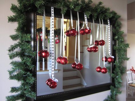 Entry way mirror decorated for #Christmas with hanging ornaments and the trick on how to hang them! | spotofteadesigns.com Christmas Mirror Decorations, Dollar Store Christmas Decor, Christmas Mirror, Christmas Entryway, Christmas Bathroom Decor, Christmas Bathroom, Dollar Store Christmas, Red Ornaments, Christmas Decorations For The Home