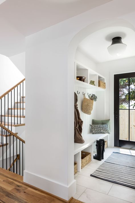 Mudroom Design | Mudroom Inspiration | Arch | Arched Doorway | Storage | Storage Solutions | Organizing | Entry | Tile | Home Design | Accessories | Interior Design | Inspiration | Inspo | Decor | Styling | Hannah Charlotte Interiors Arch Entryway Interior, Doorway Storage, Arched Entryway, Mudroom Inspiration, Foyer Cabinet, Arch Entryway, Arched Doorway, Entry Tile, Arch Doorway