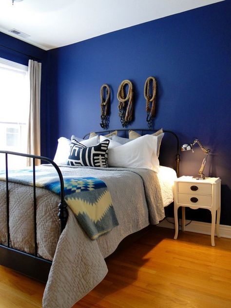 20 Bold & Beautiful Blue Wall Paint Colors   Benjamin Moore Stunning in the master bedroom of Brian & Brad's Artfully Modern Apartment. Blue Wall Paint Colors, Blue Wall Paint, Blue Bedroom Paint, Cozy Bedroom Lighting, Blue Painted Walls, Dark Blue Bedrooms, Blue Wall Colors, Perfect Paint Color, Blue Paint Colors