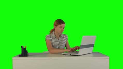 Businesswoman Working On Laptop On A Green Screen, Chroma Key. Professional Shot On BMCC RAW With High Dynamic Range. You Can Use It E.g In Your Commercial Video, Business Video, Office Theme. Vídeo stock 12222020 - Shutterstock Free Brochure Template, Office Themes, Business Video, Chroma Key, Video Streaming, Motion Picture, Stock Footage, Business Women, Screen