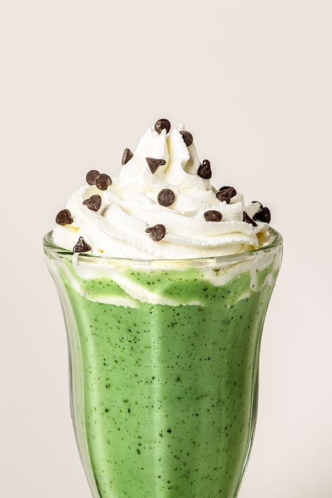 15 mins. · Serves 4 · Now you can create a refreshingly minty ice cream treat at home! Learn how to make a Copycat McDonald's Shamrock Shake with this recipe. #Recipes #Food #Crave #Tasty #Yummy #Delicious #FoodTrip #FoodLover #Recipes.net #foodporn #Cook #Cooking #Foodie #foodblog #homemade #StPatricksDayRecipe #StPatricksDayIdeas #CopycatRecipe #ShamrockShake Milkshake Ice Cream, Mint Milkshake, Passion Fruit Smoothie, Shamrock Shake Recipe, Matcha Cream, Dark Chocolate Ice Cream, Sweet Whipped Cream, Shamrock Shake, Kiwi Smoothie