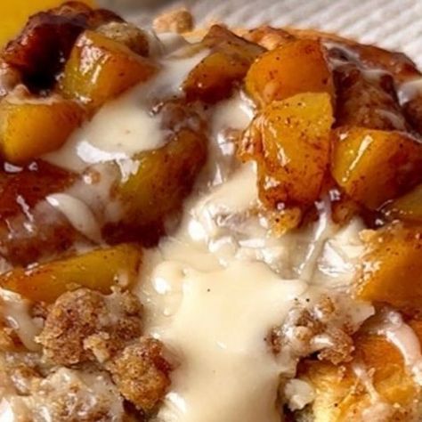 Theresa Marie Krunev on Instagram: "One Rise Peach Crumb Cinnamon Rolls 🍑😋

Do you want a printable recipe for this dessert?! Based on the response I will add to my blog. Full recipe below. 

Dough:
* 1 cup warm milk (110°F)
* 2 1/2 tsp active dry yeast, 1 package 
* 2 large eggs, room temp 
* 5 tbsp unsalted butter, melted 
* 1/2 cup granulated sugar
* 3 1/2-4 cup flour 
* 1 tsp salt
Peaches: 
* 3 large peaches or 1lb frozen peaches, diced 
* 2 tsp cinnamon
Filling:
* 5 tbsp unsalted butter, melted 
* 1 cup light brown sugar 
* 2 tbsp cinnamon
Crumb:
* 1/2 cup flour
* 1/2 cup brown sugar
* 1 tsp cinnamon
* 4 tbsp unsalted butter, melted 
Icing:
* 1 cup powder sugar 
* 3-4 tbsp maple sryrup 
* 1 tbsp milk 
Directions: 
* In a small bowl, microwave milk to 110° F, 60 secs.
* Place warm mi Cinnamon Filling, Peach Dessert, Frozen Peaches, Peach Dessert Recipes, Active Dry Yeast, Powder Sugar, Peach Desserts, Cinnamon Rolls Homemade, Printable Recipe